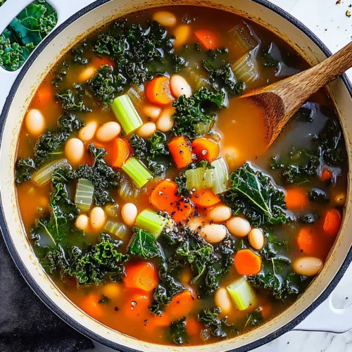 Adding seasoning to vegetable kale and bean soup with wooden spoon