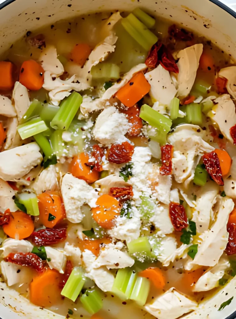 Chicken and vegetables in a pot before cooking