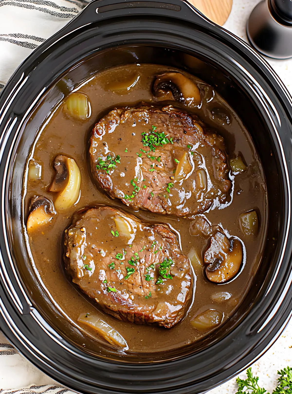Slow Cooker Round Steak and Gravy in cooking pot