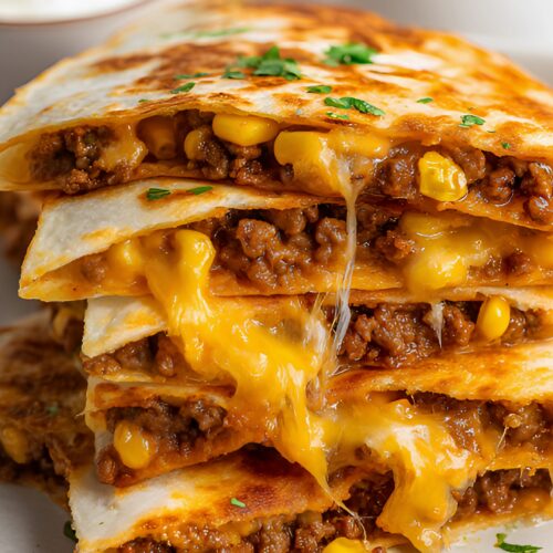 Close-up of juicy beef and cheese quesadillas