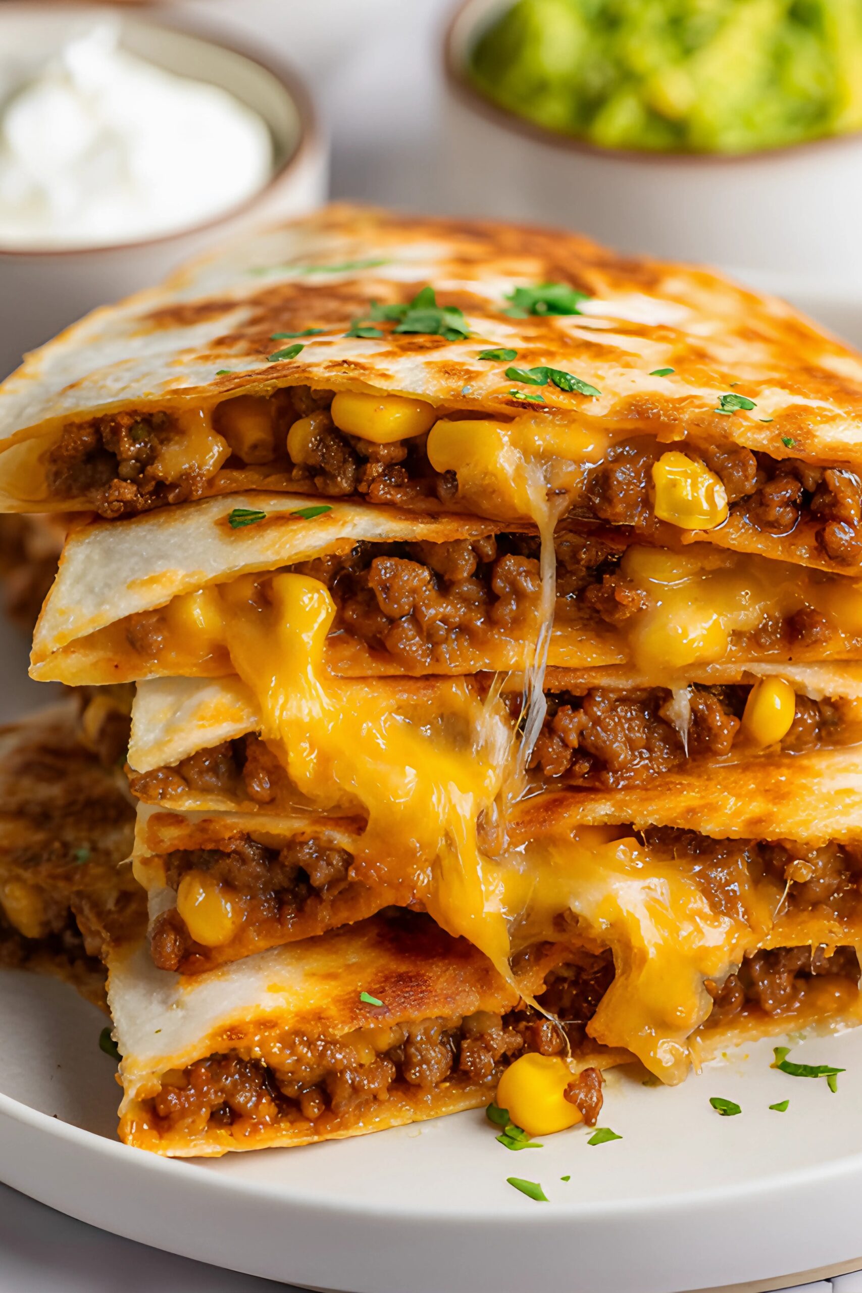 Close-up of juicy beef and cheese quesadillas