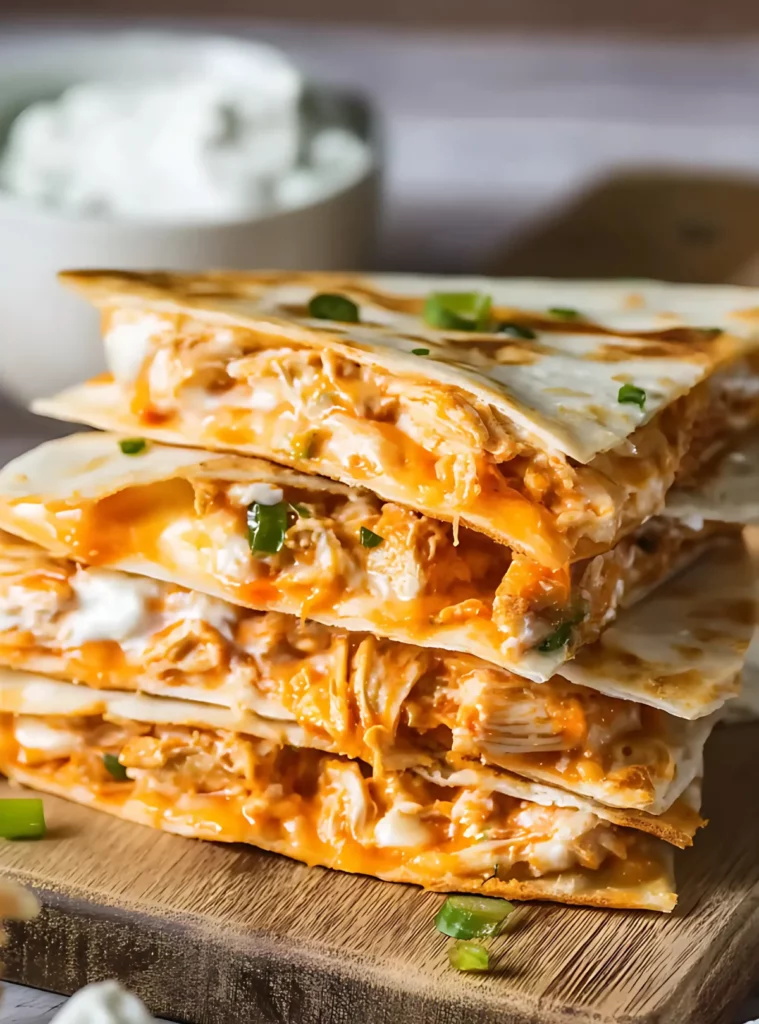Stack of cheesy buffalo chicken quesadillas