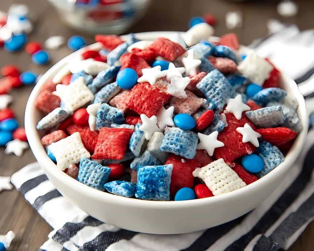 Chex mix with M&Ms in a bowl with soft background
