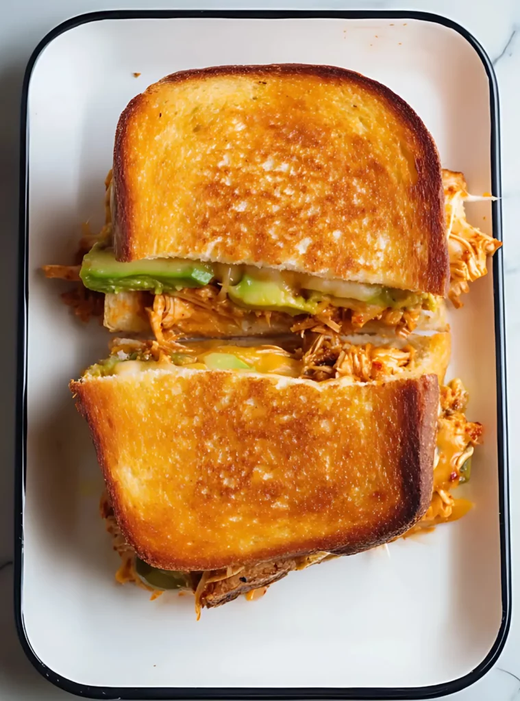 Crispy grilled sandwich on white plate