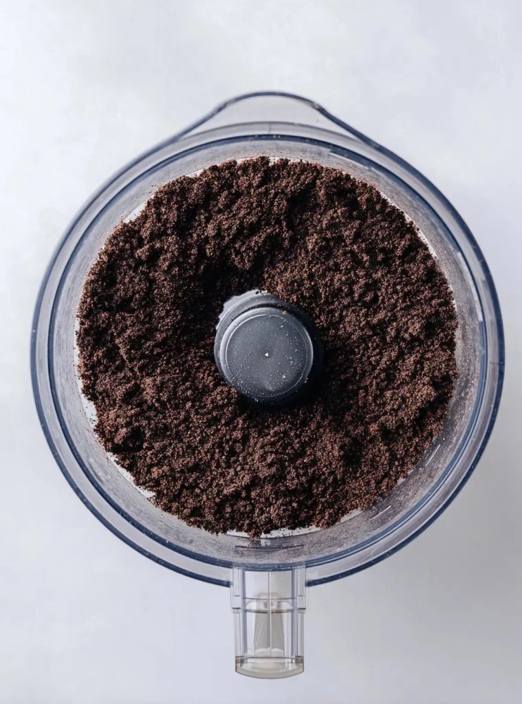 Crushed Oreo cookies in processor