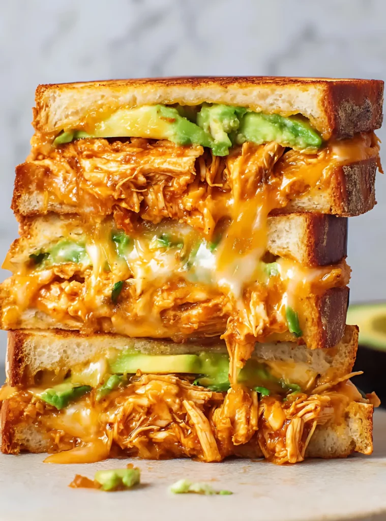 Melty sandwich with avocado chicken and cheese