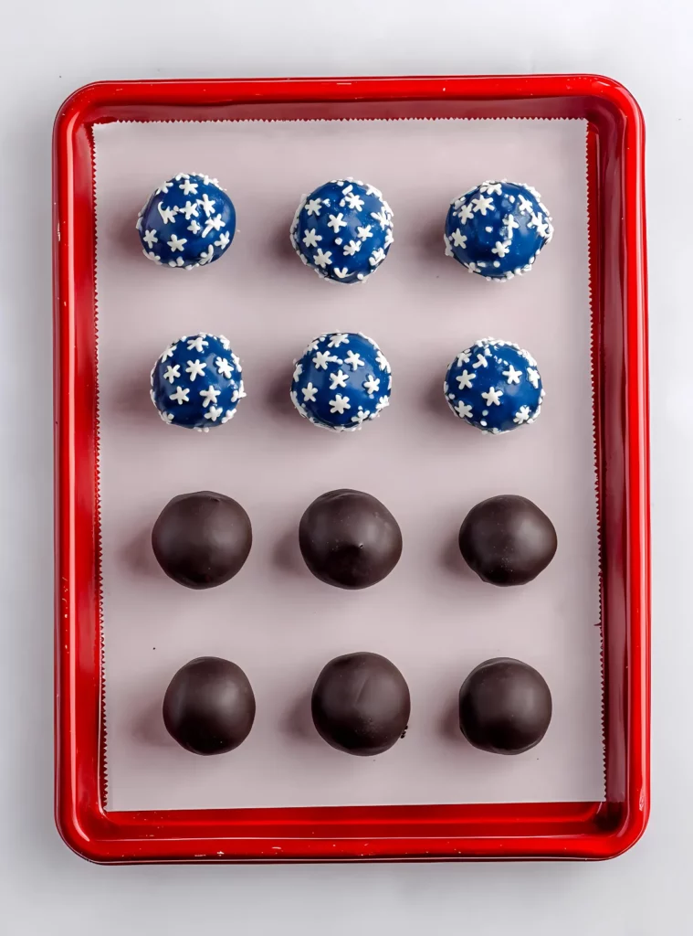Tray of blue and plain balls