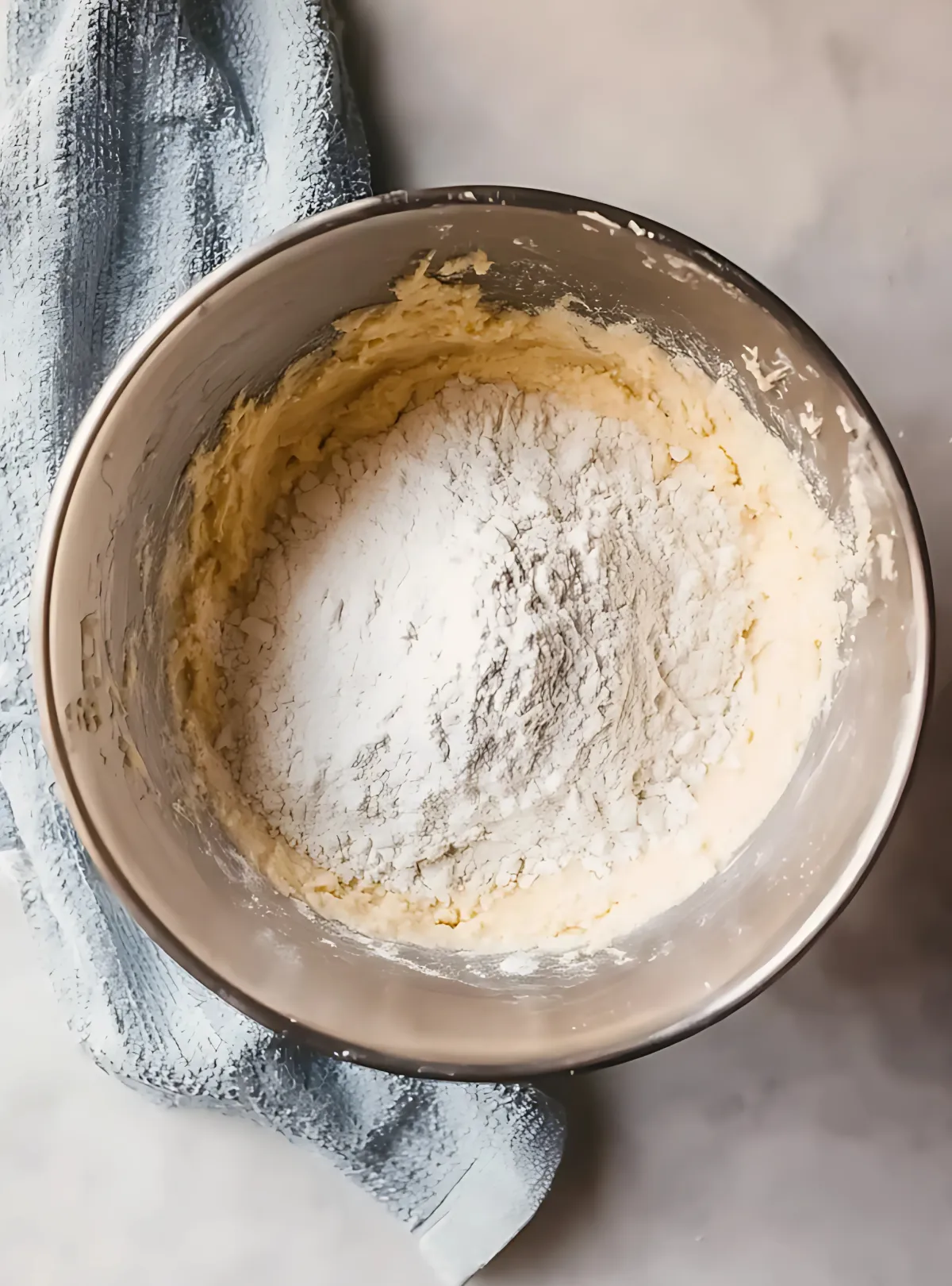 mixing bowl with flour on dough
