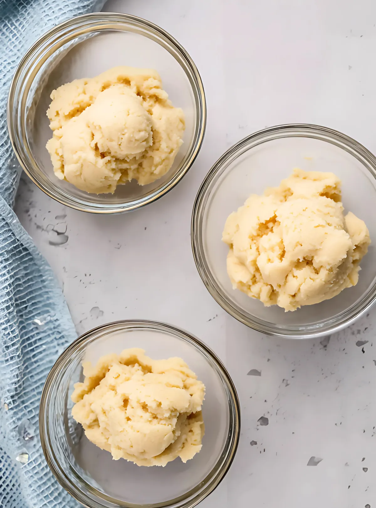 three bowls with plain cookie dough