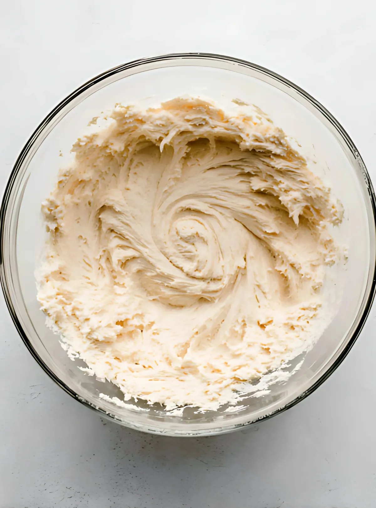 Creamed butter and sugar in swirl pattern