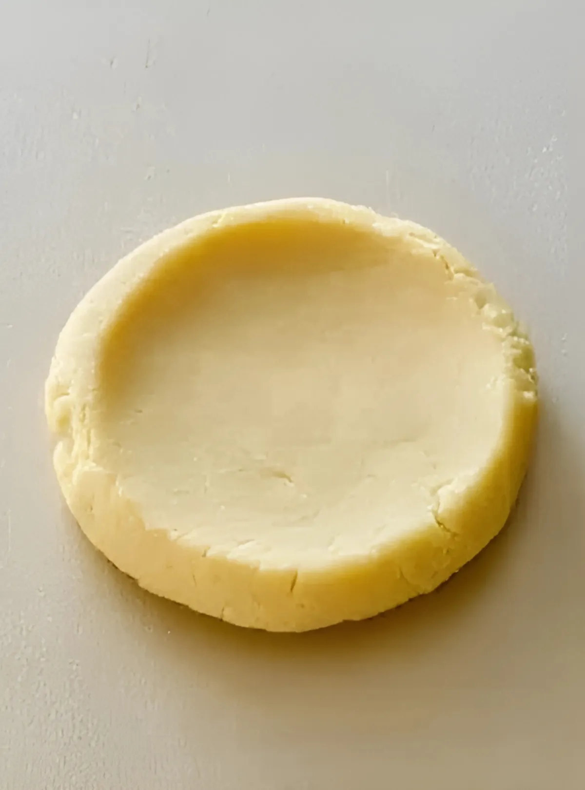 Flattened sugar cookie dough with ridge