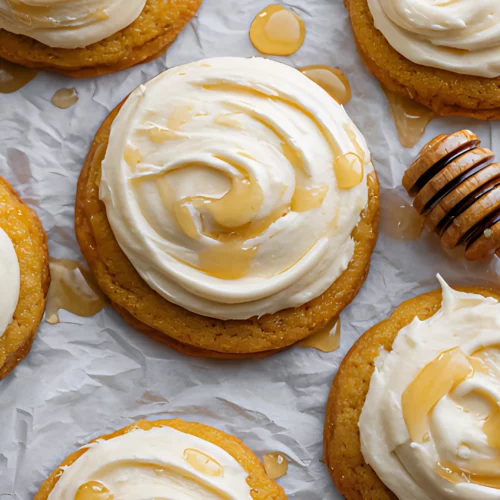 Frosted cornbread cookies with honey drizzle and honey dipper