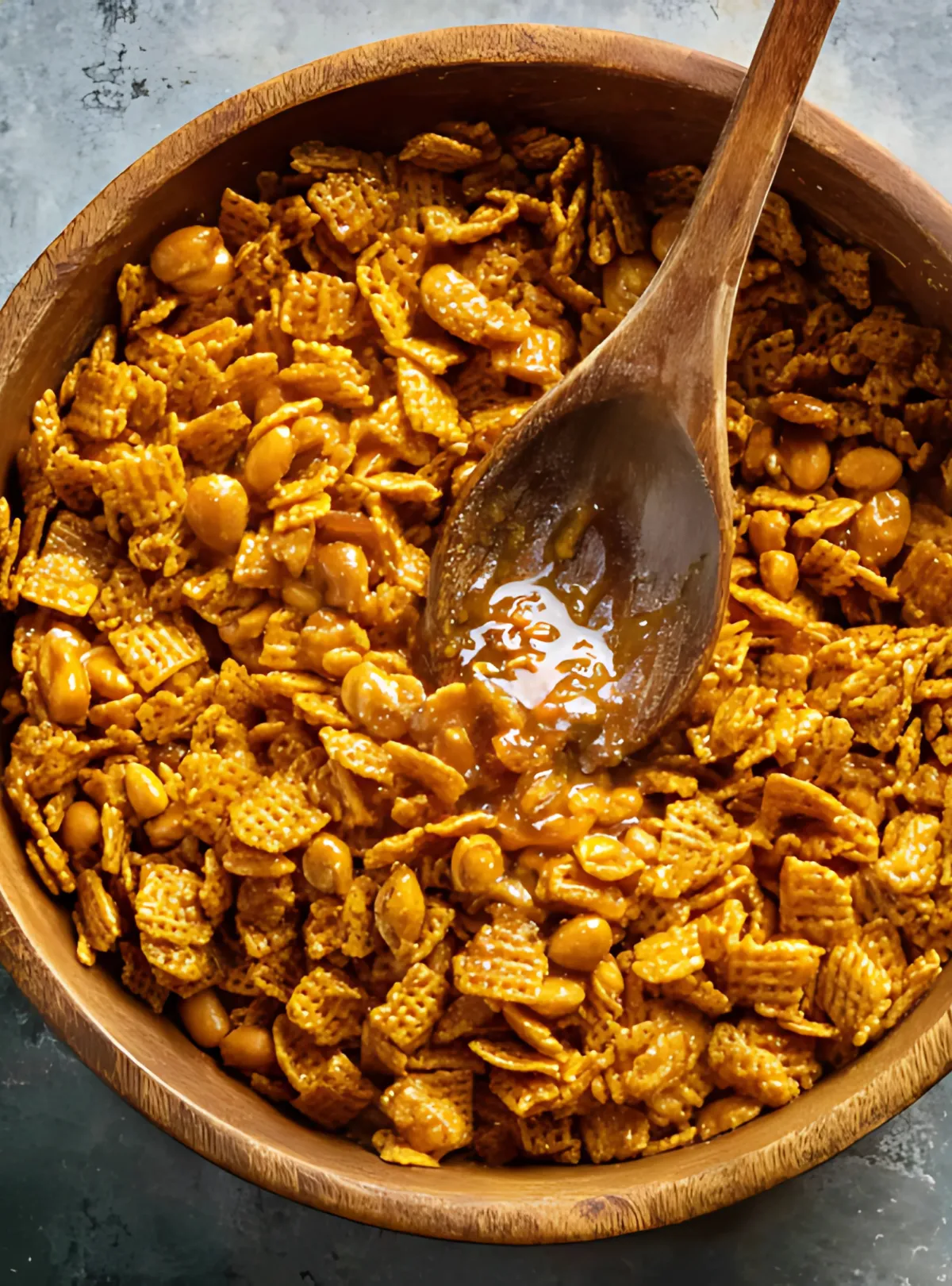 Cereal and peanuts coated in caramel