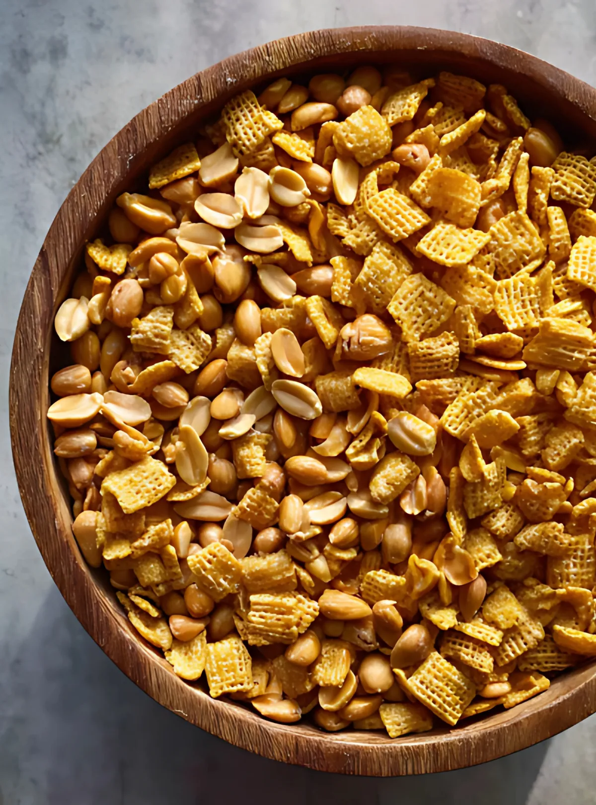 Cereal and peanuts in a wooden bowl