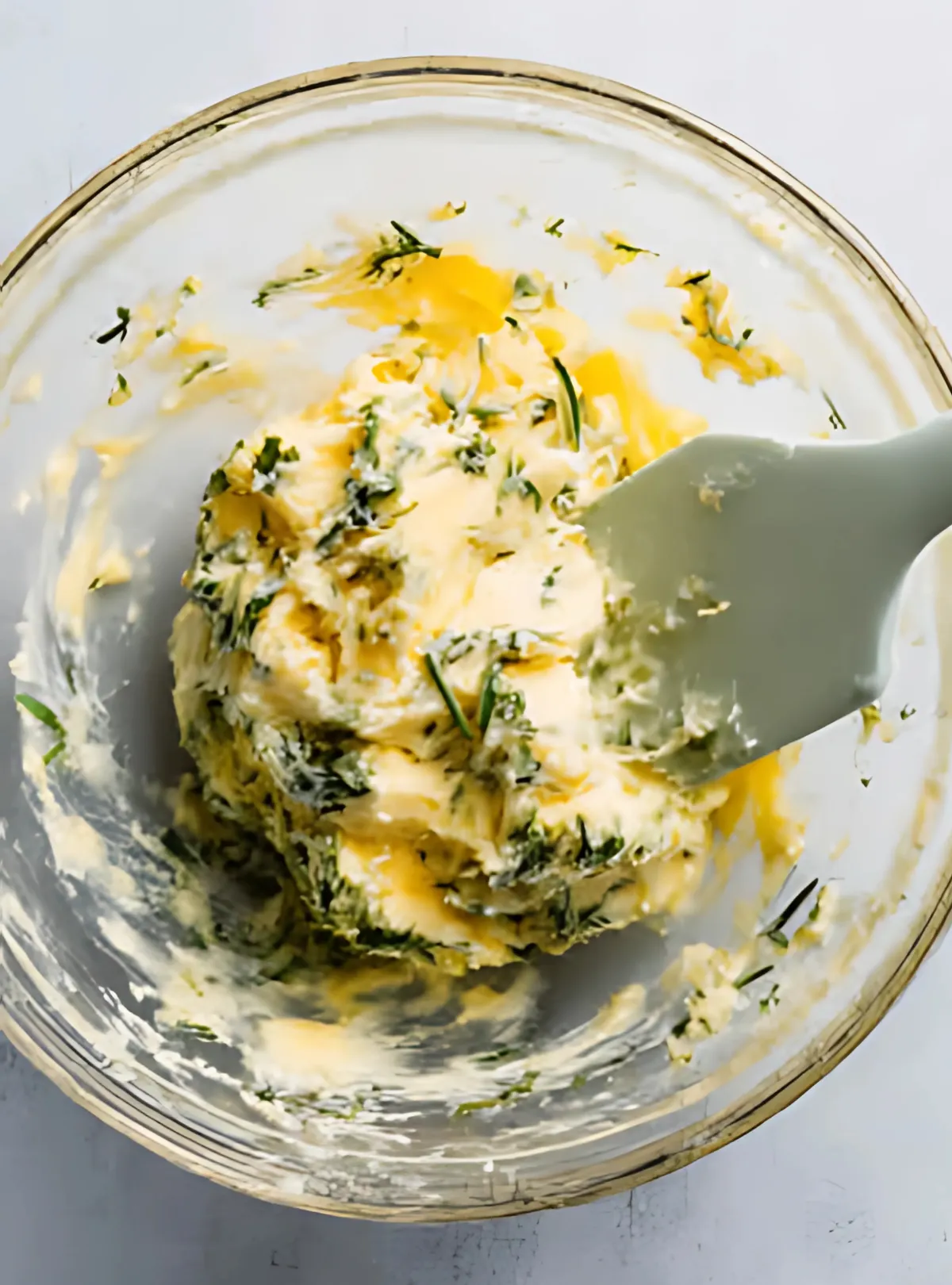 Garlic herb butter in mixing bowl