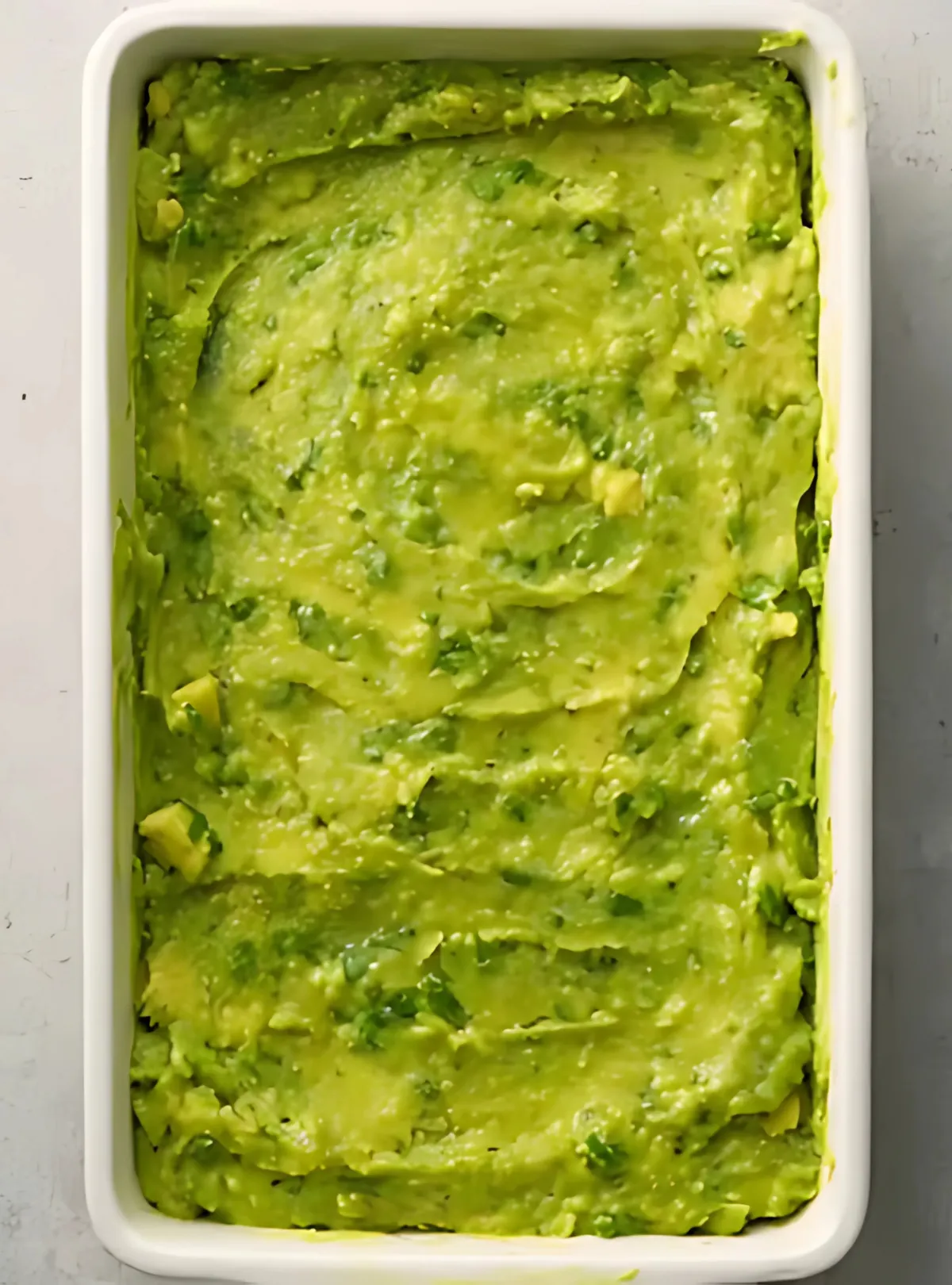 Guacamole layer in white dish