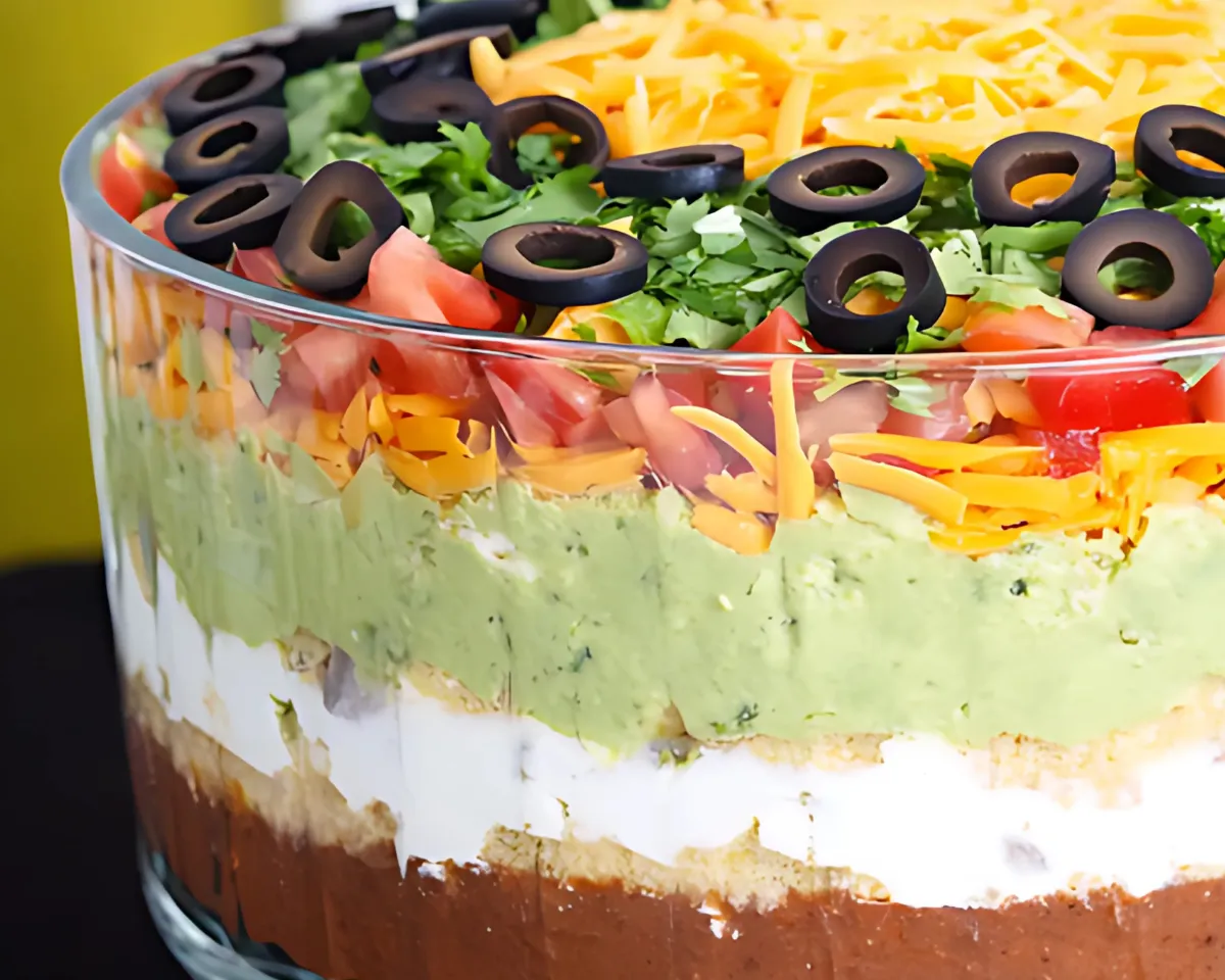 Layered dip in glass bowl
