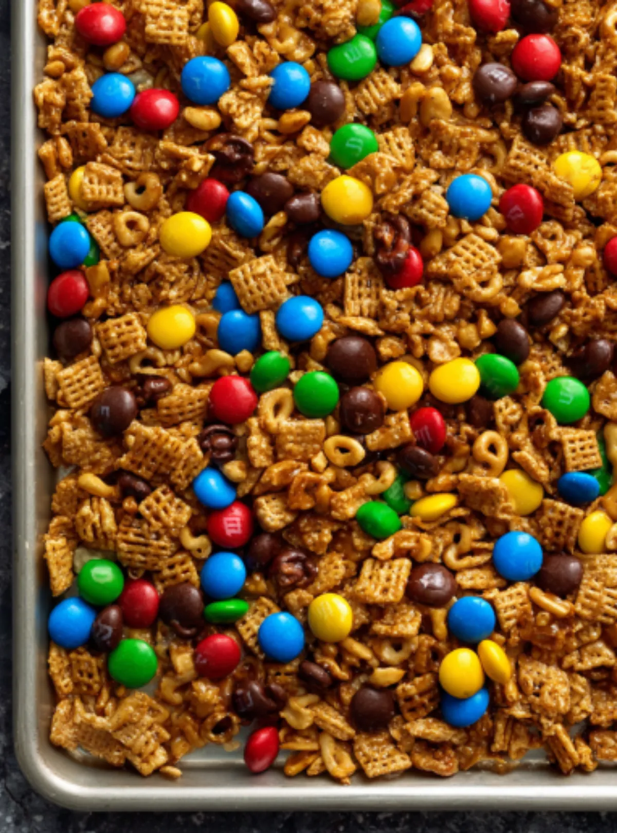 Snack mix with colorful M&M's on tray