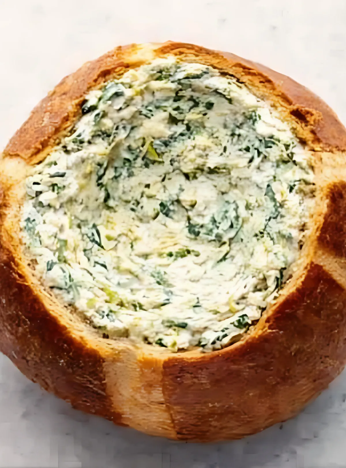 baked spinach dip with bread pieces