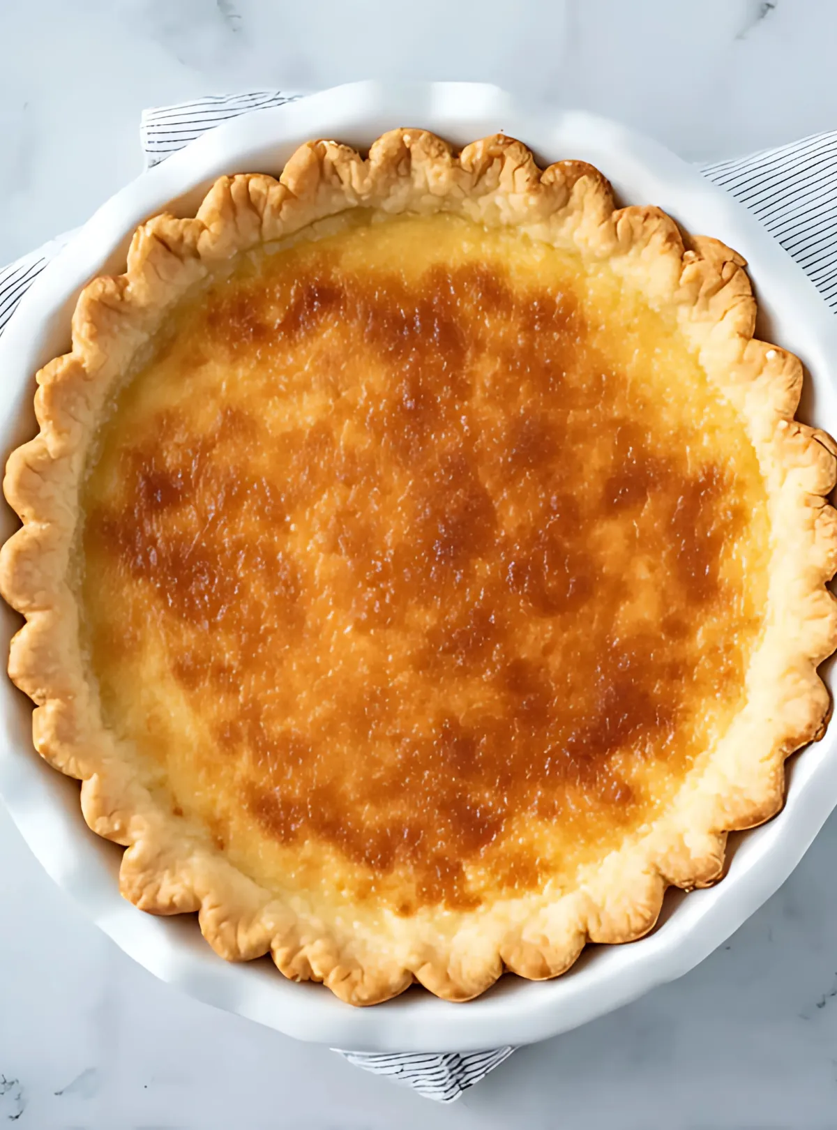baked vinegar pie in white dish