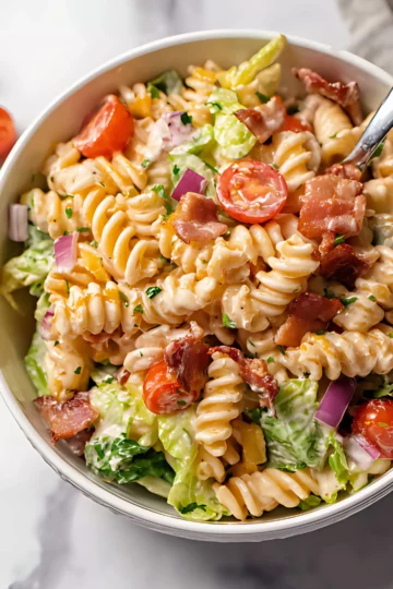 creamy BLT pasta salad in white bowl