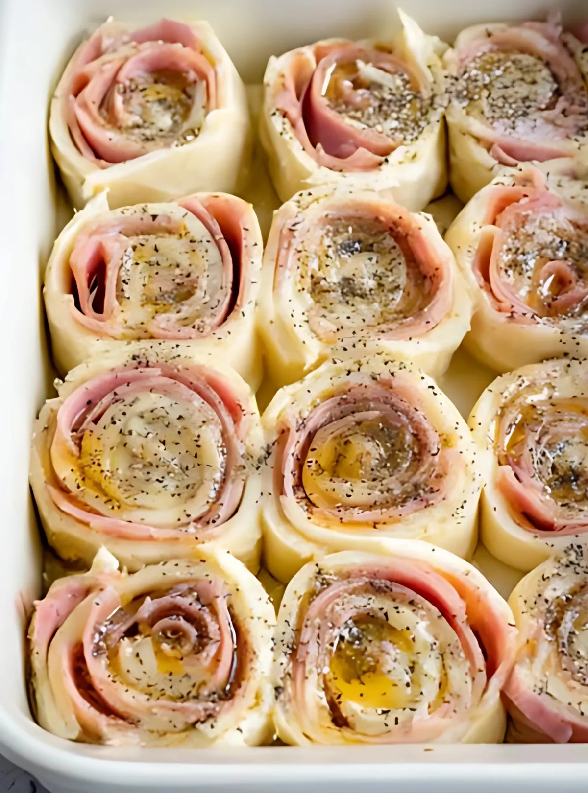 unbaked pinwheels with glaze