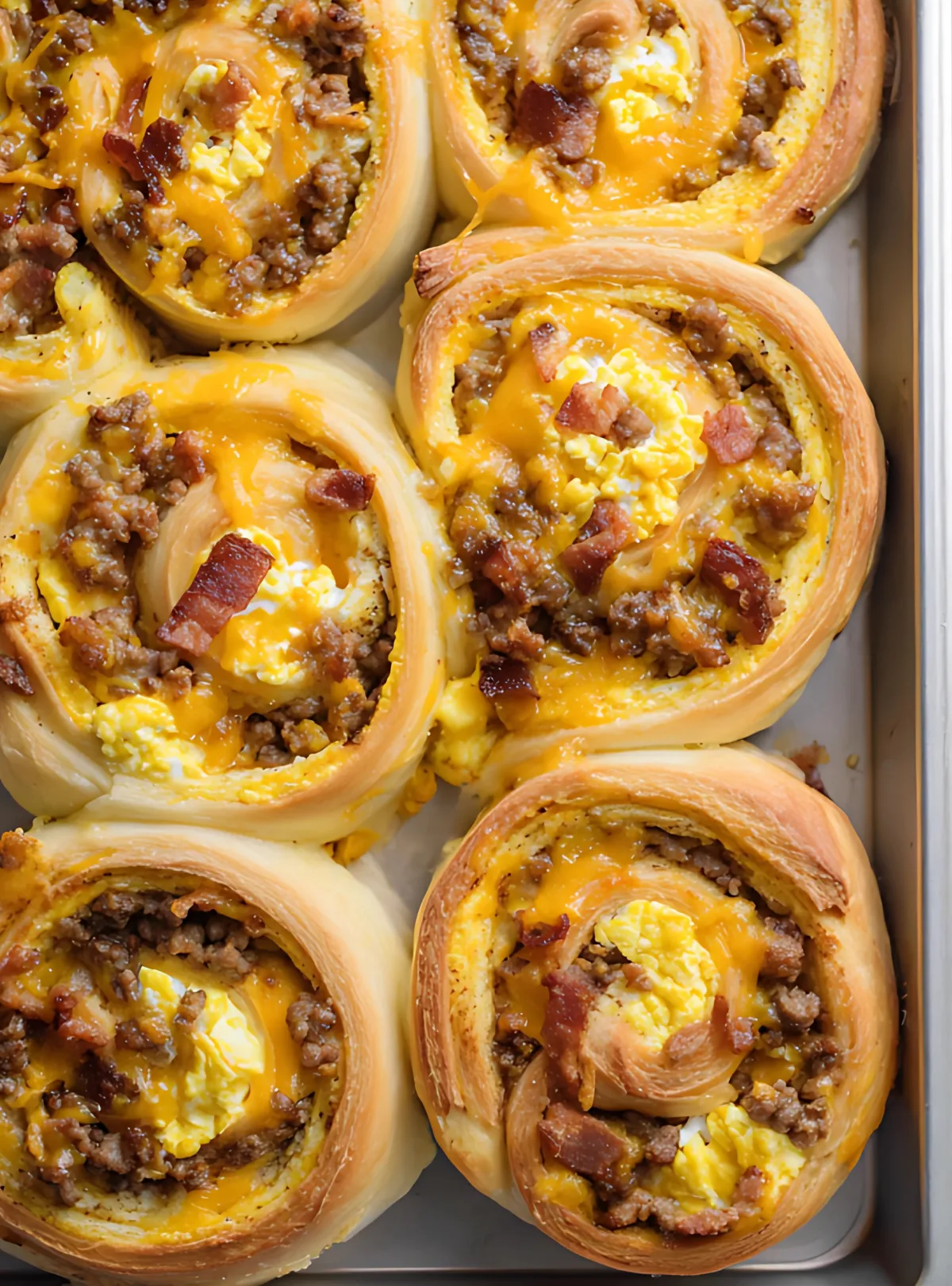 Baked breakfast rolls with sausage egg and bacon