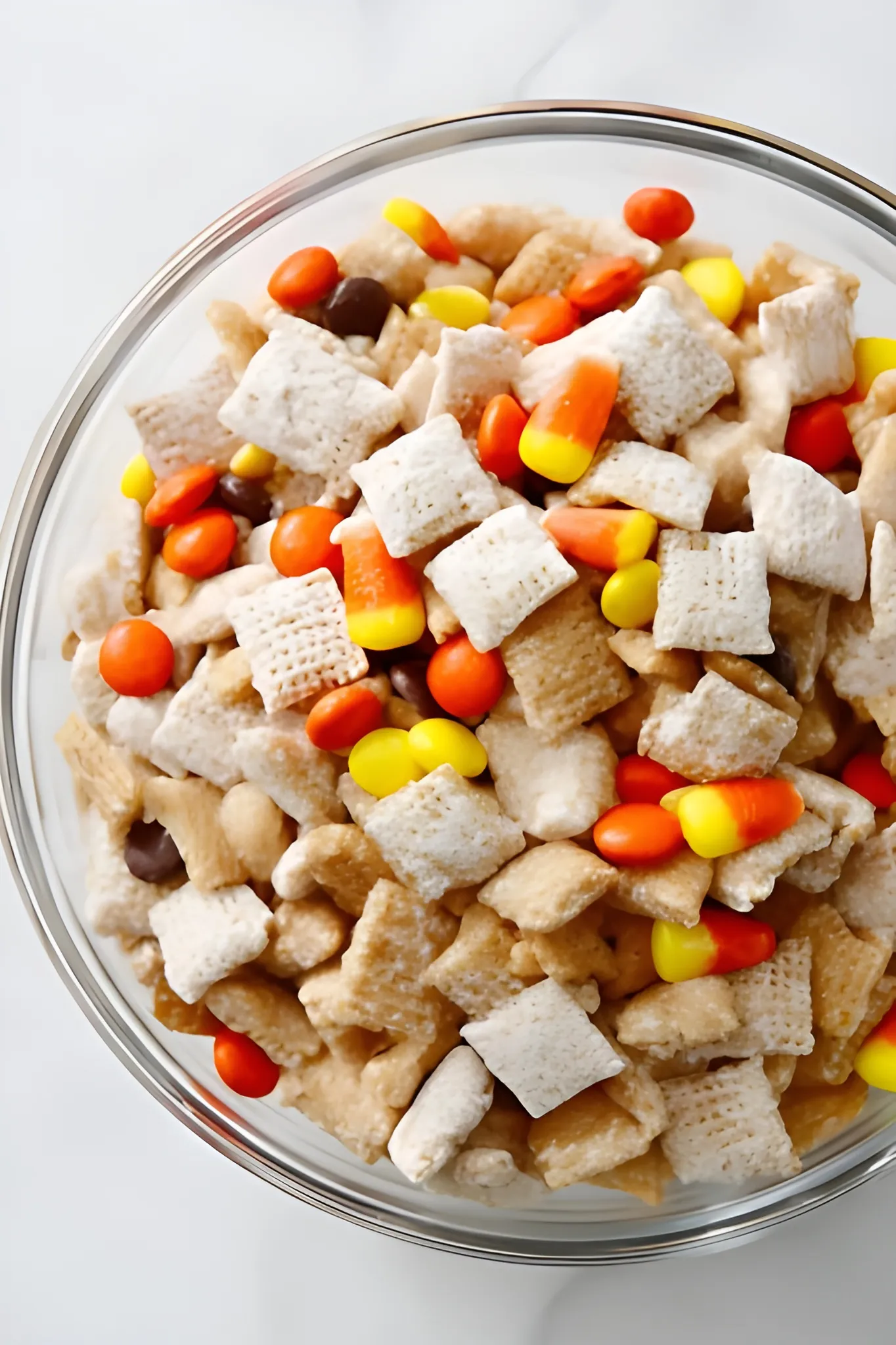 Bowl of puppy chow with candy pieces