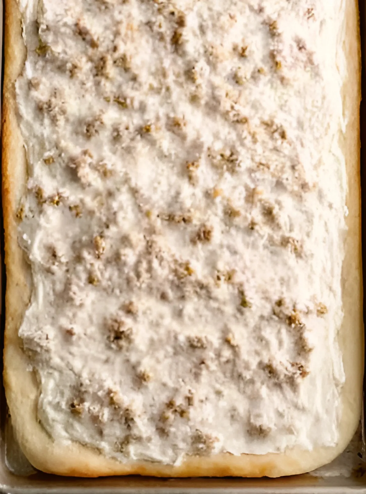 Crust topped with sausage gravy