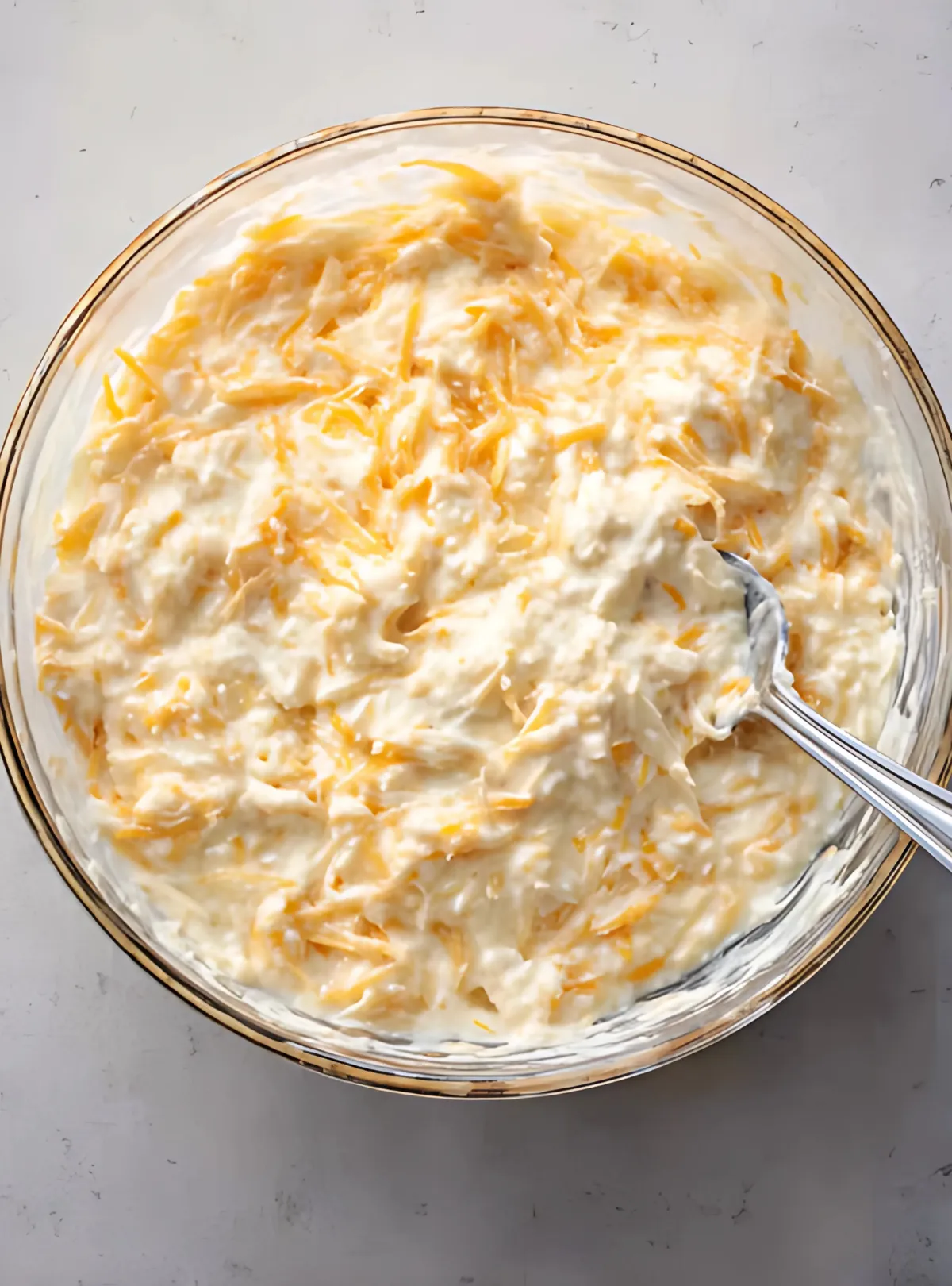Mixing bowl of cheesy potato filling