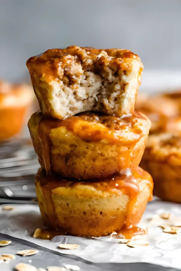 Muffins stacked with syrup drizzle