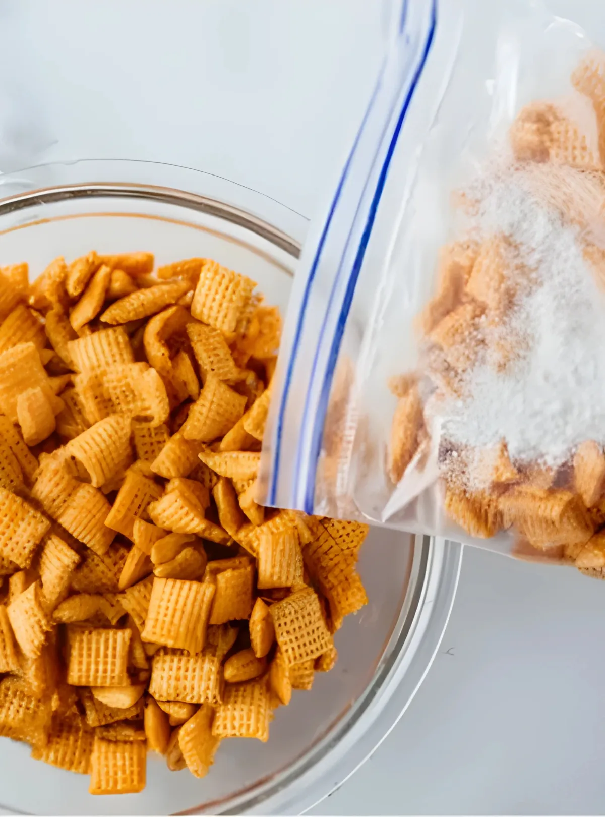 Ziploc bag with powdered sugar and Chex cereal