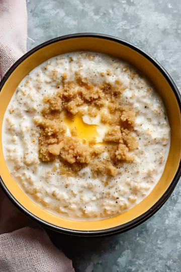 bowl of oatmeal with melted butter and brown sugar