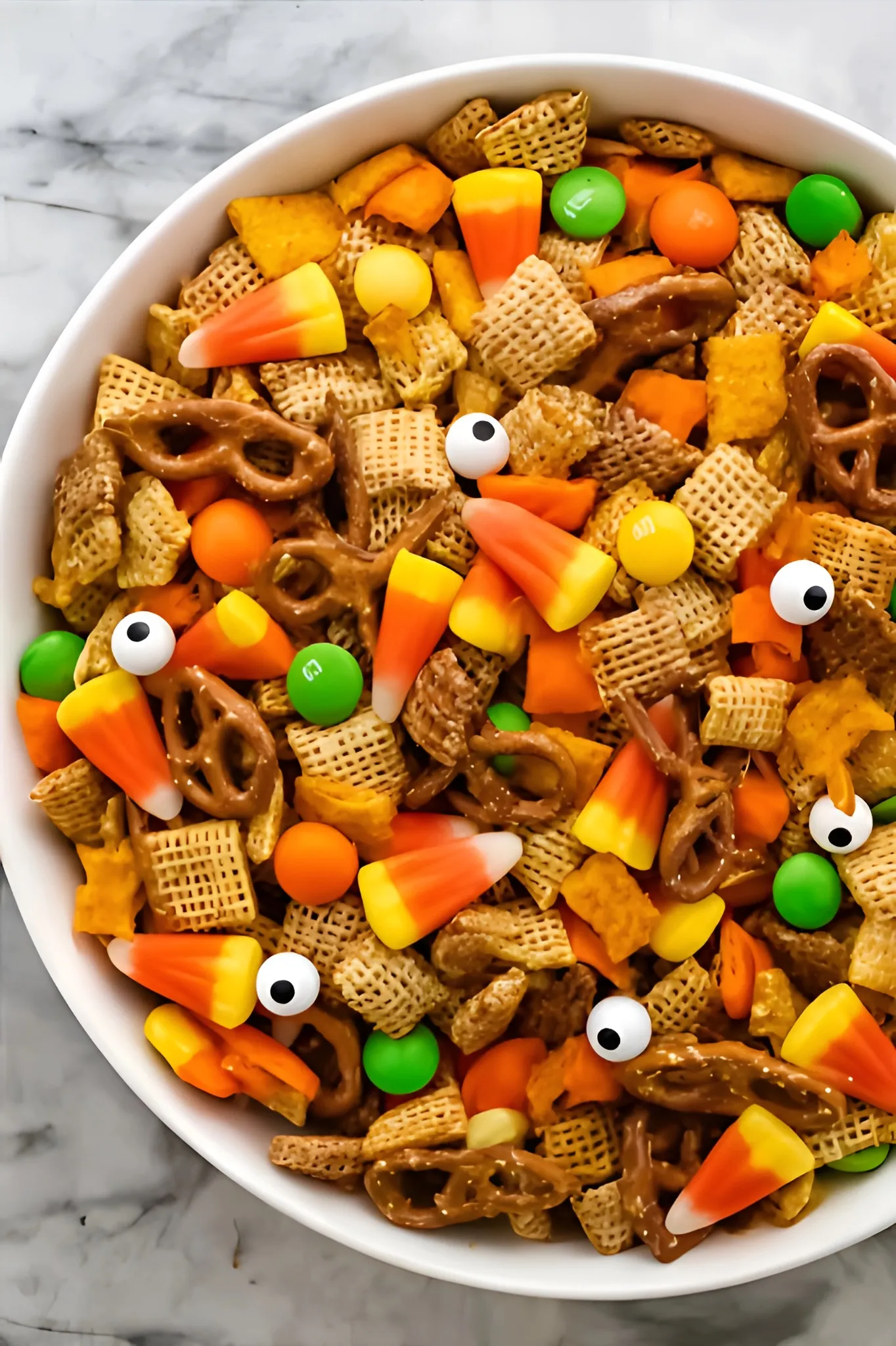 halloween snack mix with candy corn and eyeballs