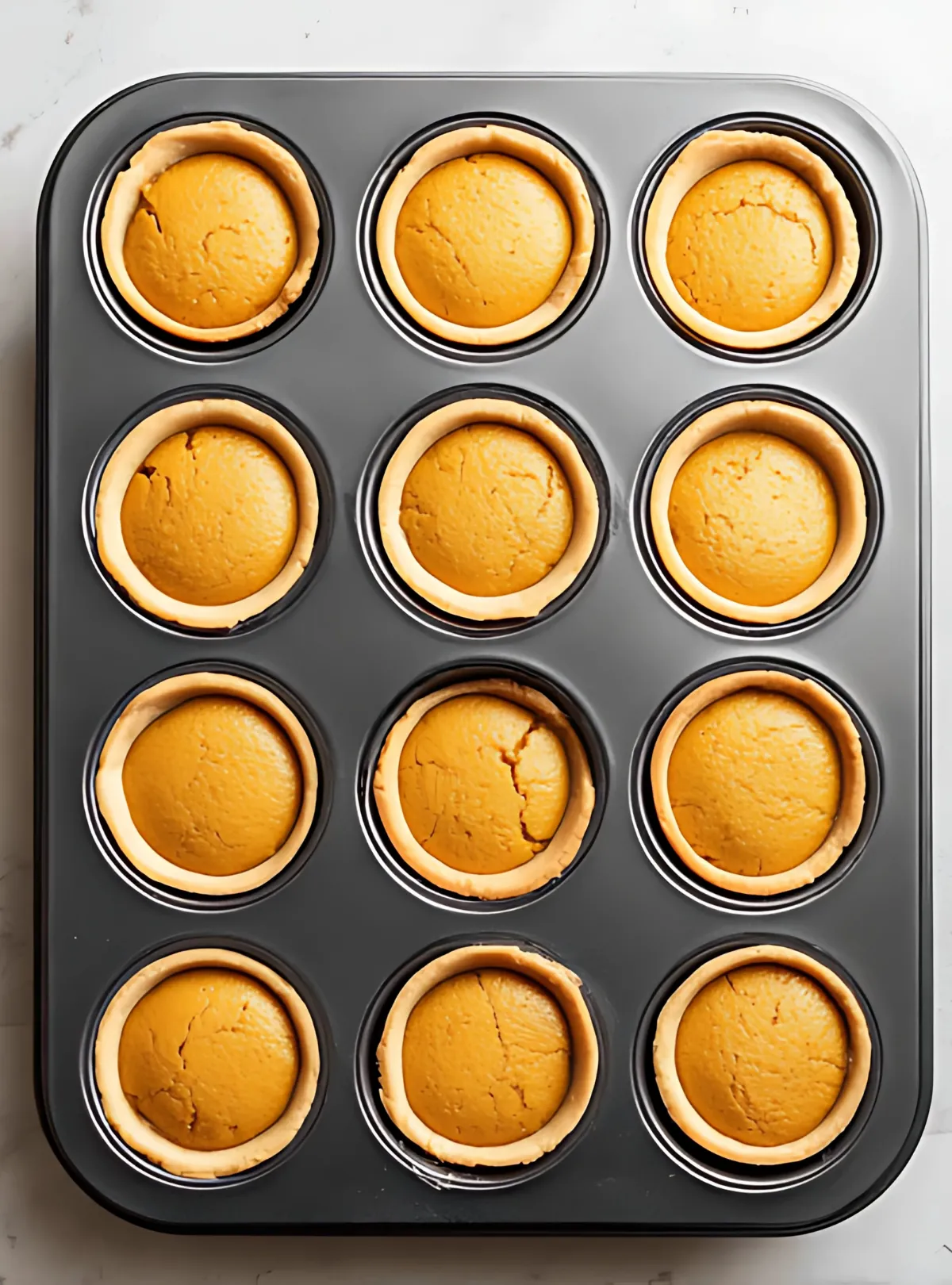 Baked mini pumpkin pies tray