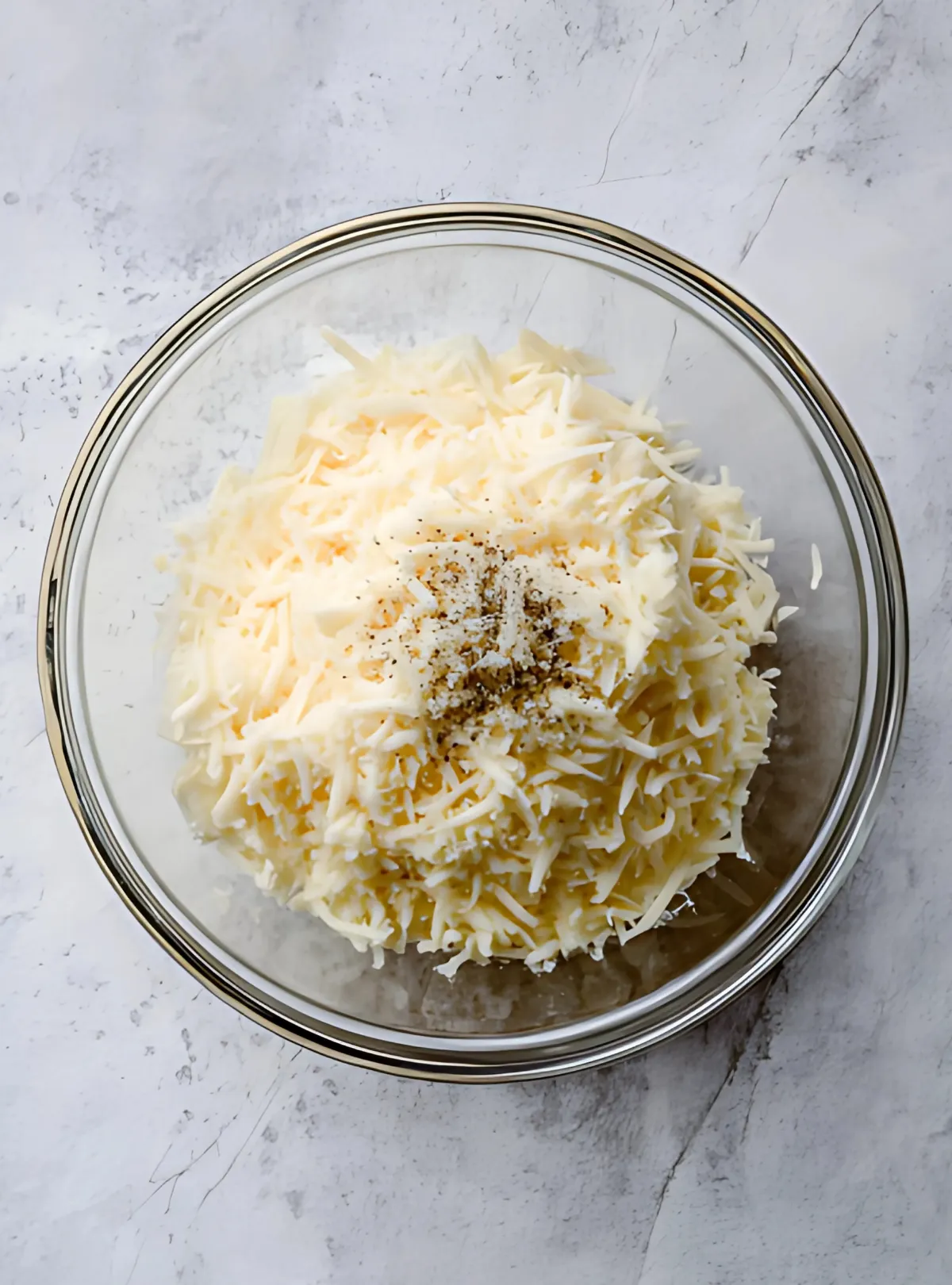 Bowl of grated cheese pepper