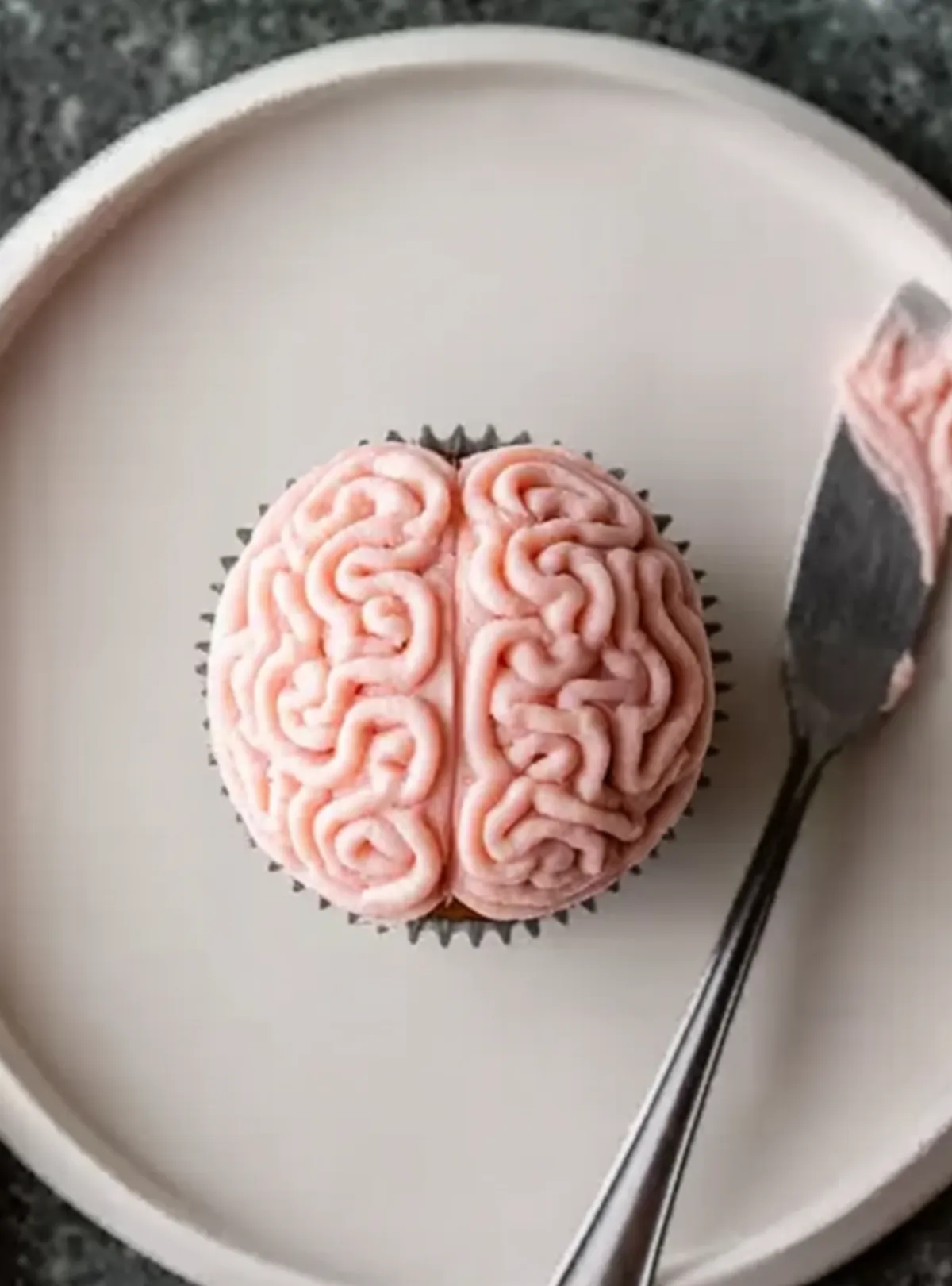 Brain frosting cupcake