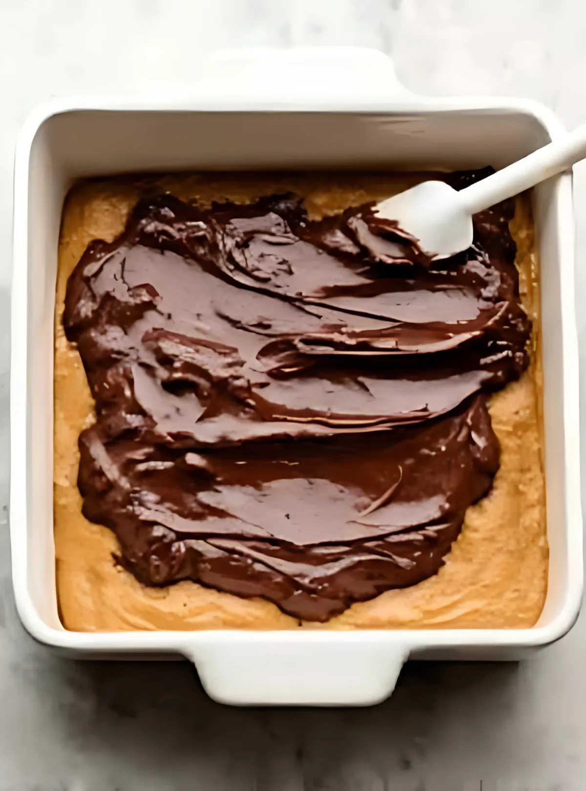 brownie batter over pumpkin