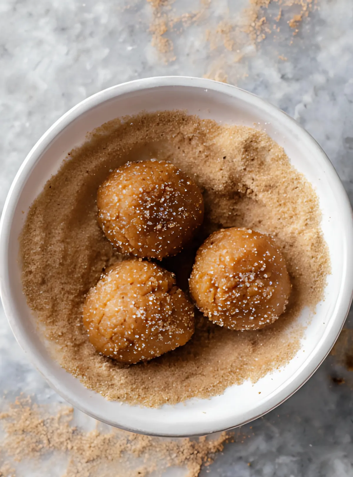 cookie dough balls rolled in cinnamon sugar
