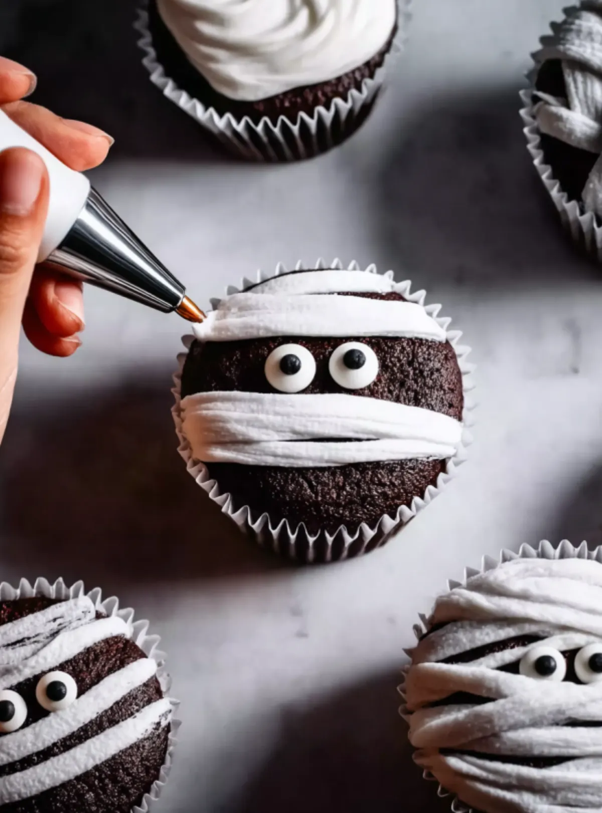 piping mummy cupcake action