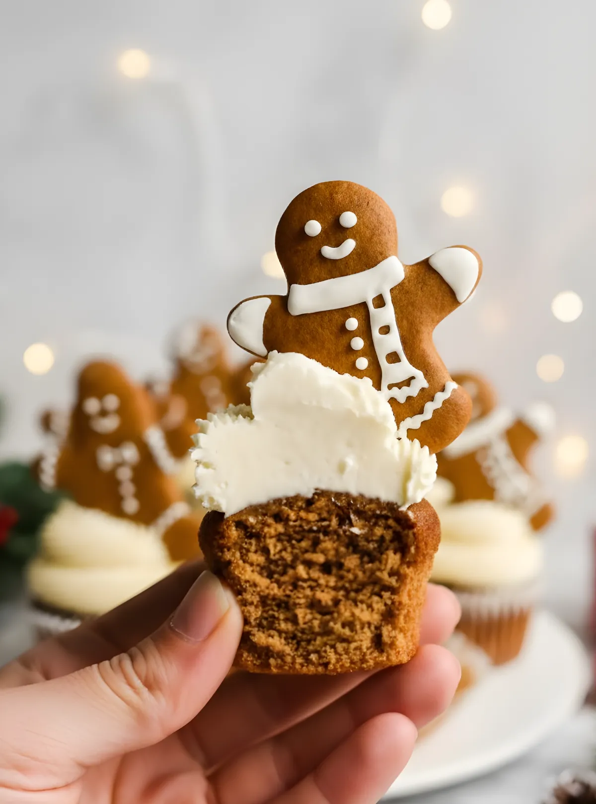 Hand holding cupcake