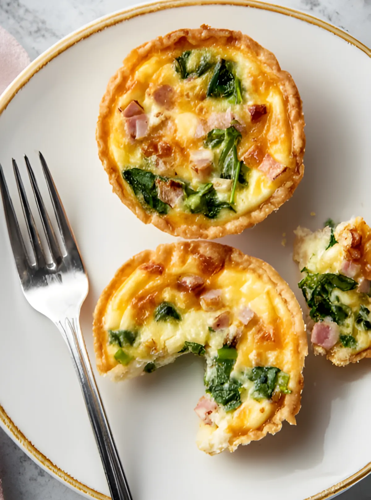 Mini quiche with fork