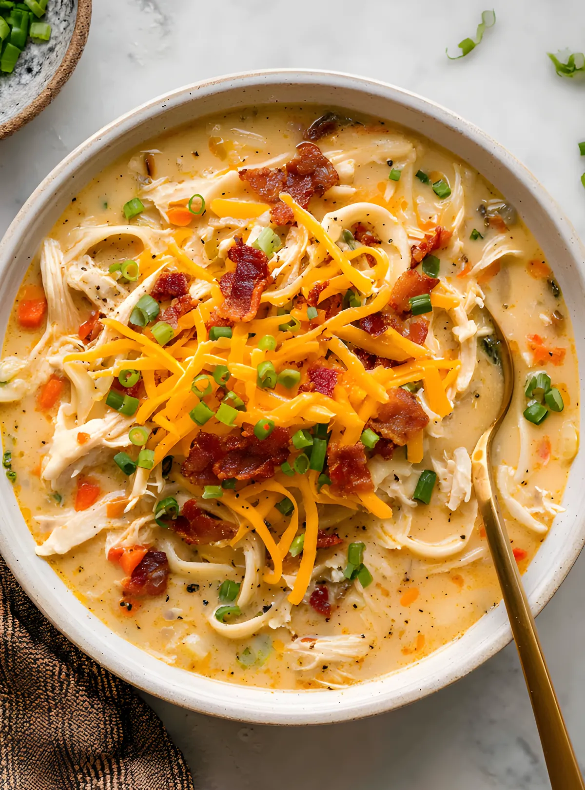 bowl of cheesy chicken soup