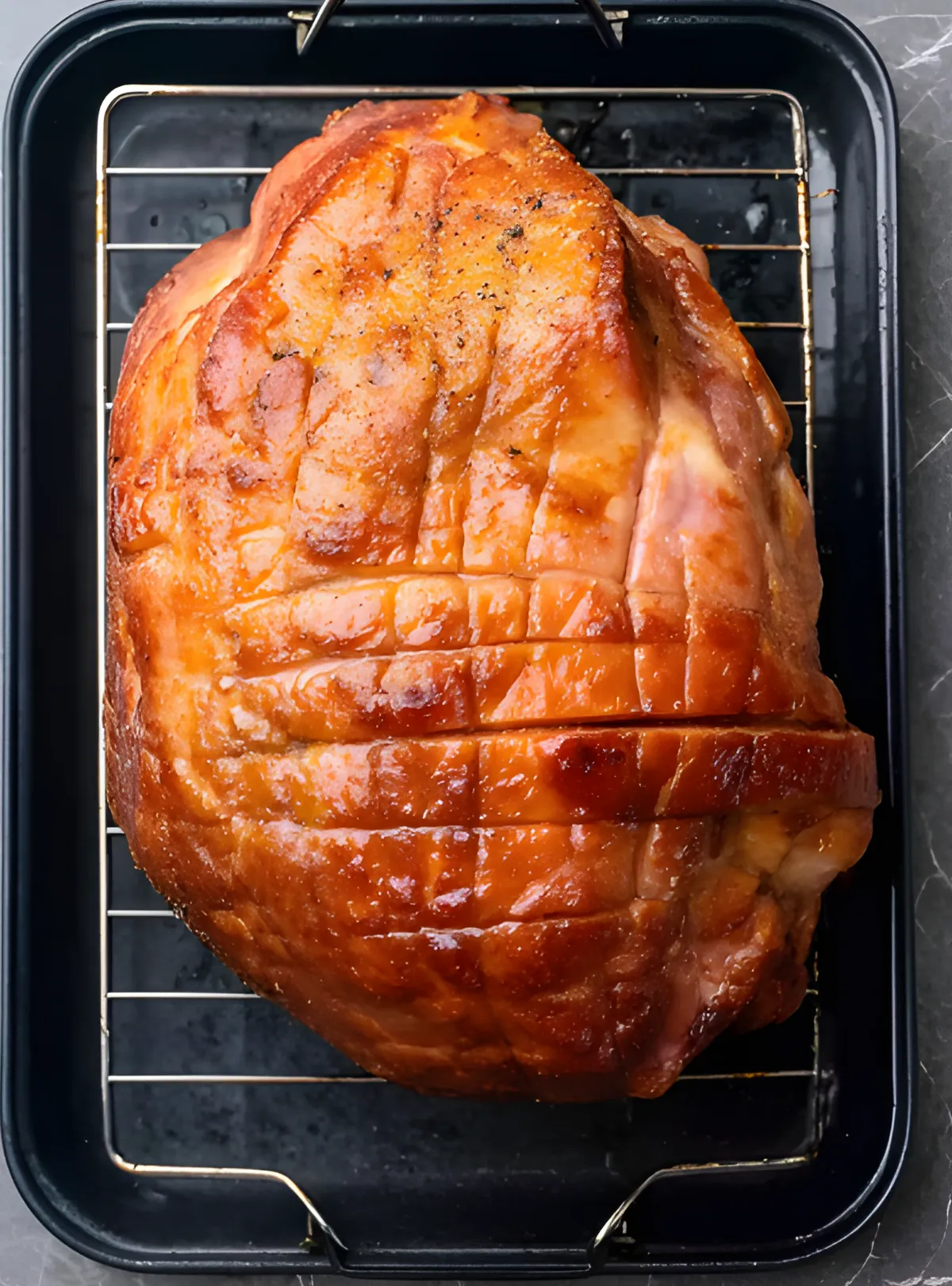 roasted ham on rack