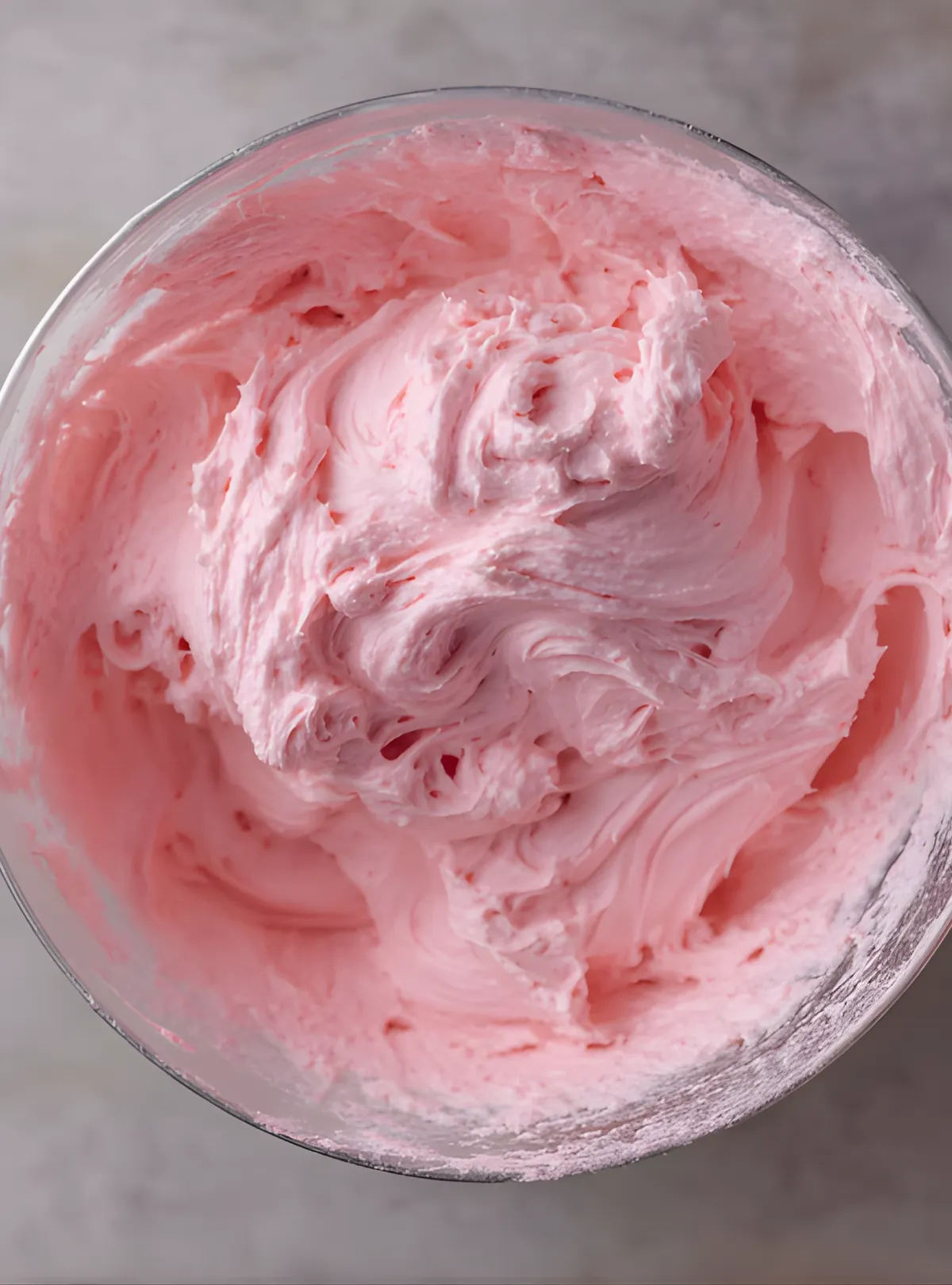Pink buttercream frosting bowl